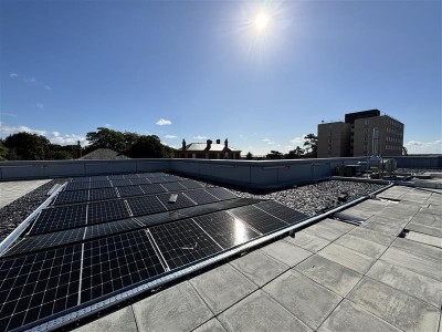 Photo showing solar panels on the roof of the Emergency Department at QA Hospital