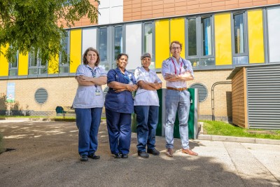 Group of staff at PHU smiling